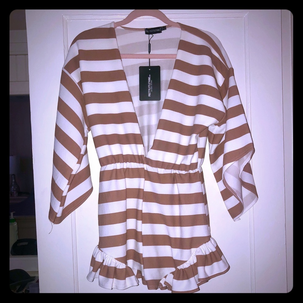 Pretty little thing striped romper never been worn